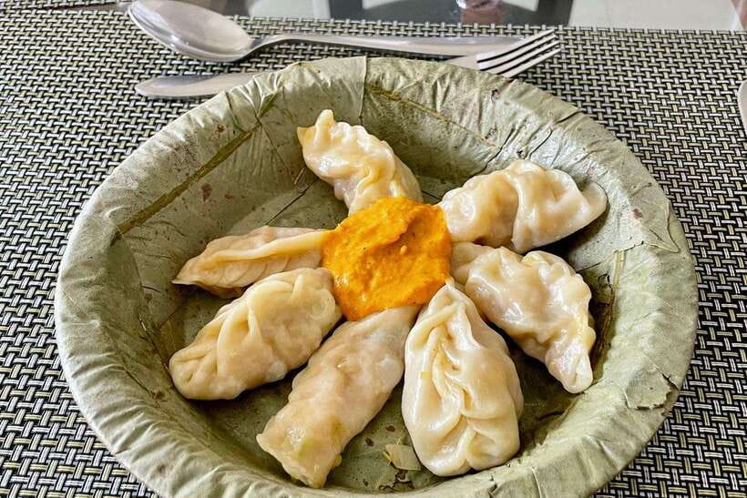 Kathmandu: Traditional Momo Making Class & Pickup - Mixing, folding, and steaming the momos