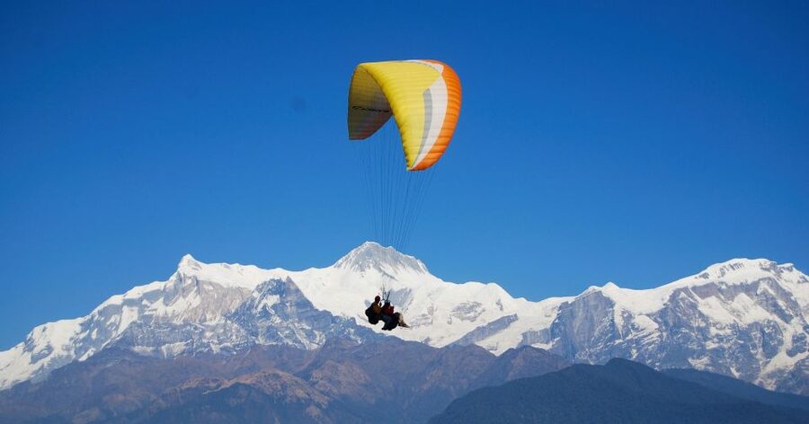 Pokhara: Adventure Paragliding Trip with Photos and Videos - Meeting the pilot and preparing for takeoff